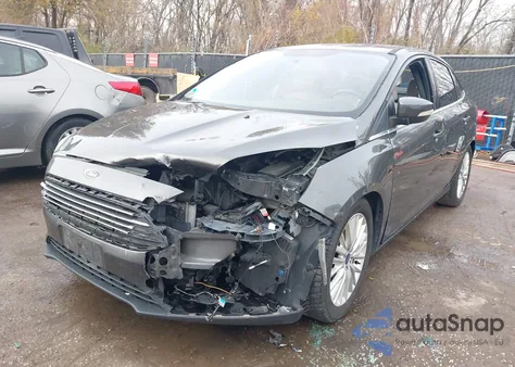 2015 Ford Focus Titanium из США, поврежденный, VIN 1FADP3J28FL293822